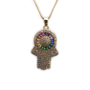 Macro view of Hamsa Hand pendant with zircon micro-pave and colorful stones on a gold chain