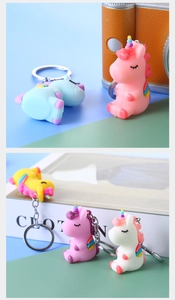 Colorful unicorn PVC soft rubber keychains in pink blue yellow and white tones