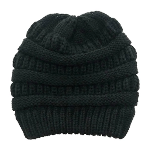 Detailed close-up showing the thick black chunky knit texture of the winter ear muff hat