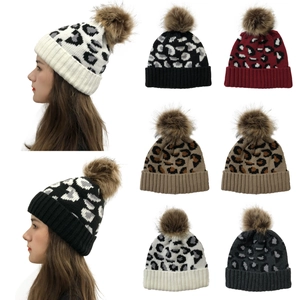 Detailed collage of leopard print knit beanies with fluffy pom-poms in various colors