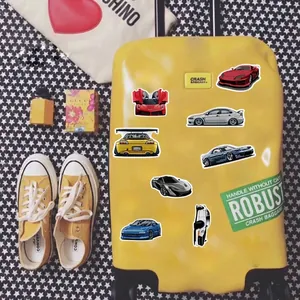 Set of 100 waterproof cartoon JDM supercar graffiti stickers on a yellow suitcase