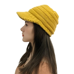 Women's yellow cable knit beanie with brim for outdoor winter warmth and ear protection