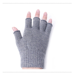 Close-up of grey knitted fingerless gloves showing texture and hand-worn fit