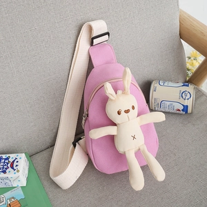 Pink canvas kid's chest bag with 3D bunny plush toy and adjustable wide strap