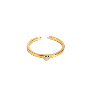 Minimalist gold plated adjustable ring with a sparkling round cubic zirconia stone