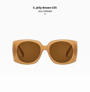 Detail of jelly brown rectangle sunglasses with tinted lenses and transparent frame