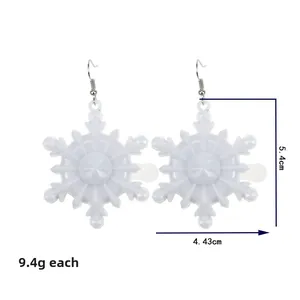 Detailed size view of white snowflake LED earrings with dimensions 5.4cm by 4.43cm