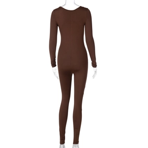 Detail of coffee brown ribbed jumpsuit showing back view and slim fit texture