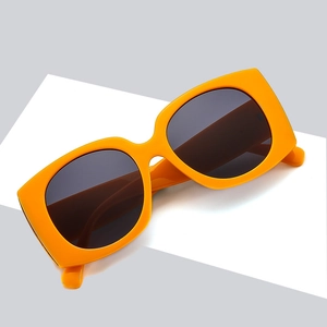 Retro oversized bright orange square sunglasses with thick frames and dark grey lenses