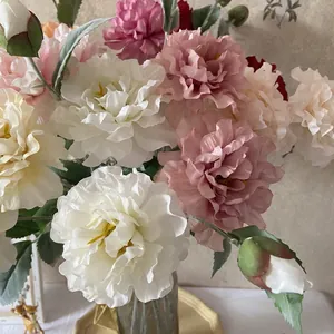 Three-headed artificial peony bouquet in glass vase for home and wedding decor
