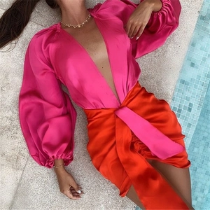 Pink satin deep V-neck bodysuit and orange bow-knot mini skirt set by the poolside
