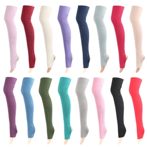 Flat lay of knit leg warmers in various colors featuring ribbed texture and heel openings