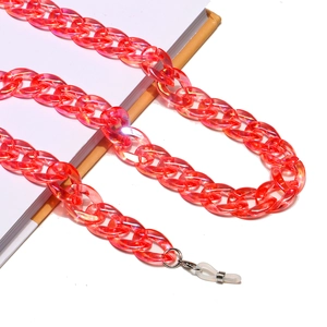 Detailed view of pink translucent acrylic eyeglass chain with silver rings and rubber grips