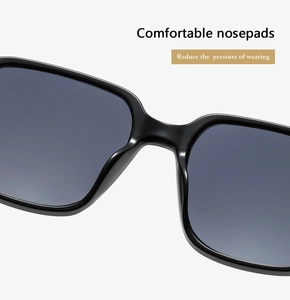 Close-up of comfortable integrated nose pads on black retro sunglasses frames