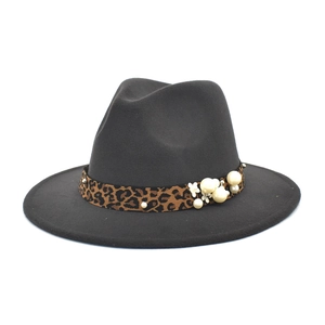 Detail of grey wool fedora featuring leopard print band with pearls and floral accents