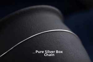 Macro shot of 925 sterling silver box chain showing fine square link structure