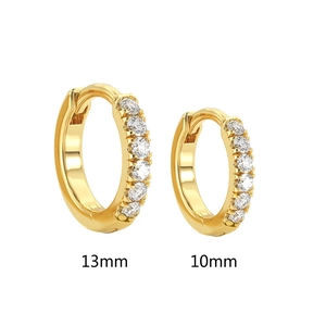 Detail view of gold hoop earrings with zircons in sizes 10mm and 13mm on white background