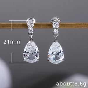 Elegant silver-toned pear-cut cubic zirconia drop earrings with triple stone design