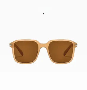 Detail of jelly brown square sunglasses frame with matching lenses and metal hinge details
