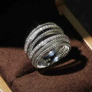 Macro shot of 925 silver ring featuring micro-pave cubic zirconia and 925 hallmark
