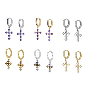 Detailed view of S925 silver hoop earrings with zircon crosses in gold and silver finishes