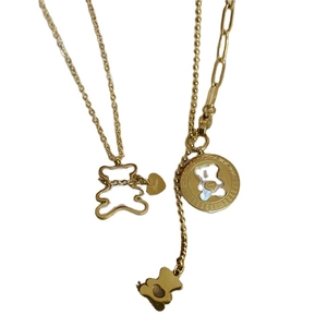 Golden stainless steel bear pendant necklaces set with mother of pearl and Love engraving