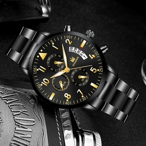 Detail view of business quartz watch with black metal band and gold-tone markers
