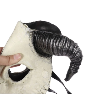Detail of 3D ram skull mask showing off-white bone texture and black spiraled horns