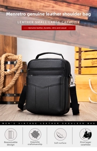 Close-up of premium black lychee grain genuine leather texture on a men's crossbody bag