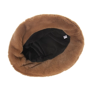 Detail shot of the plush leopard bear ear hat interior featuring the white care label