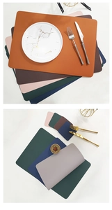 Waterproof faux leather placemats and coasters with litchi texture in various colors