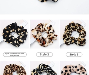 Close-up of assorted scrunchies featuring leopard, zebra prints and polka dot patterns