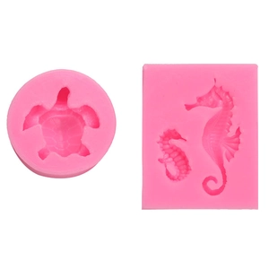 Pink silicone marine molds set featuring sea turtles and seahorses for fondant cake decor