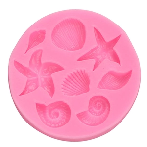 Pink ocean themed silicone mold for fondant and chocolate featuring shells and starfish