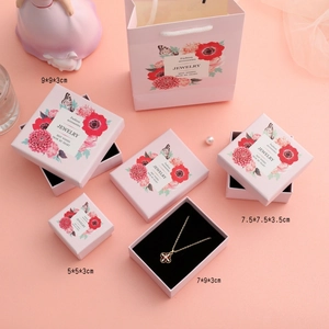 Pink jewelry packaging set with gift bags and boxes in multiple sizes for necklaces