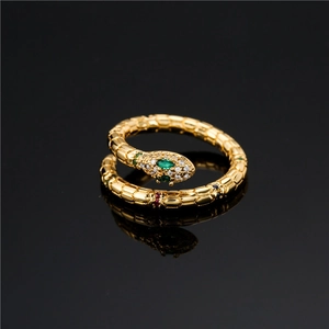 Creative gold snake open ring with colorful zircon stones on elegant black background