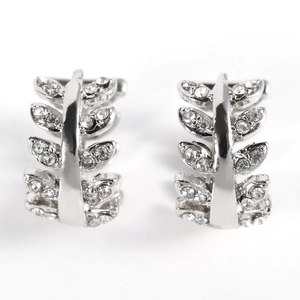 Elegant silver leaf earrings with sparkling cubic zirconia stones in a natural design