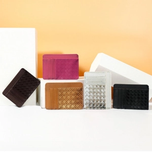 Quilted accordion card holders in multiple colors arranged on geometric stands
