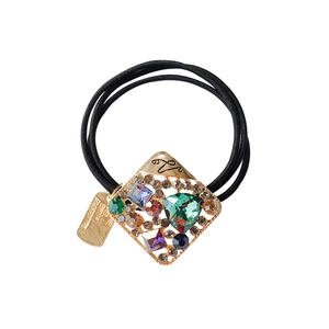 Élastique à cheveux baroque avec pendentif strass doré et cristaux colorés sur lien noir