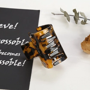 Classic tortoise shell acetate hair claw clip with geometric square design for women