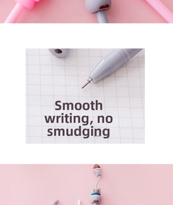 Macro detail of fine needle-point pen tip writing on purple grid paper smoothly