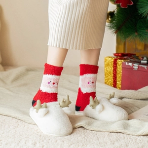 Cozy red Christmas coral fleece socks with Santa Claus pattern and plush slippers