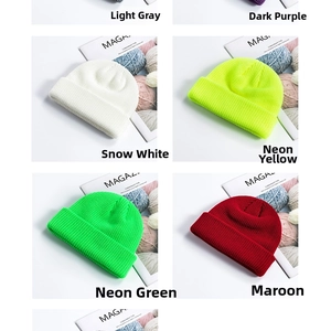 Detailed grid of waffle-knit docker hats in grey, purple, and green with folded brims