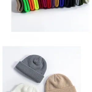 Close-up of multicolored knit beanies showing ribbed texture and vibrant color options