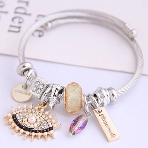 Silver stainless steel evil eye charm bracelet with purple crystals and handmade tags