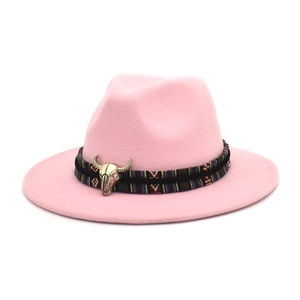 Pink felt fedora hat featuring a boho woven band and vintage bull head metal ornament