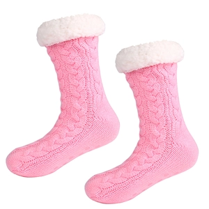 Pink thermal knit slipper socks with white plush trim and non-slip soles for indoor use