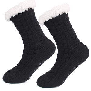 Thick knit slipper socks with warm fleece lining and non-slip grippers on sole