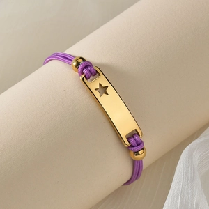 Purple braided rope bracelet with 18K gold-plated bar featuring star cutout design