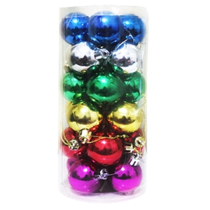 Assorted shiny metallic Christmas balls in transparent cylindrical storage packaging